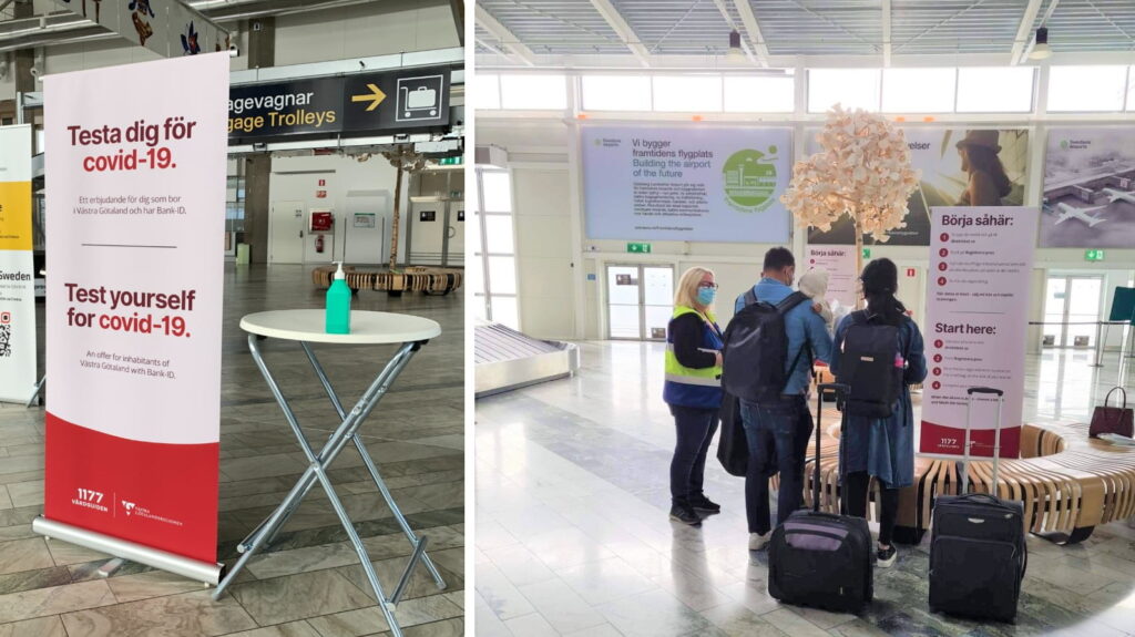 informationstavla med handsprit och en familj som anlänt med flyg som får information om provtagning.