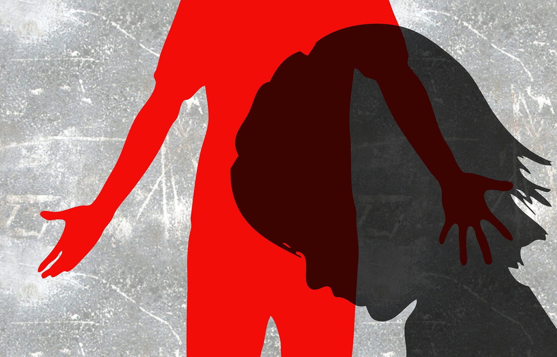 två personer där den ena verkar ha slagit den andra